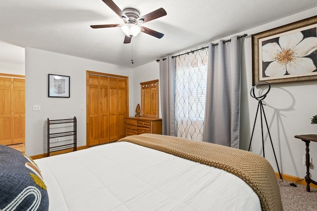 bedroom featuring ceiling fan, a closet, and a textured ceiling