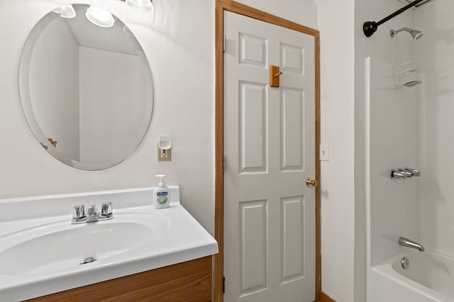 bathroom featuring shower / washtub combination and sink