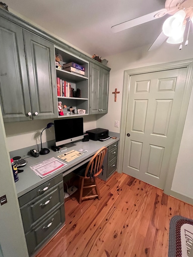 home office featuring ceiling fan and light wood-type flooring