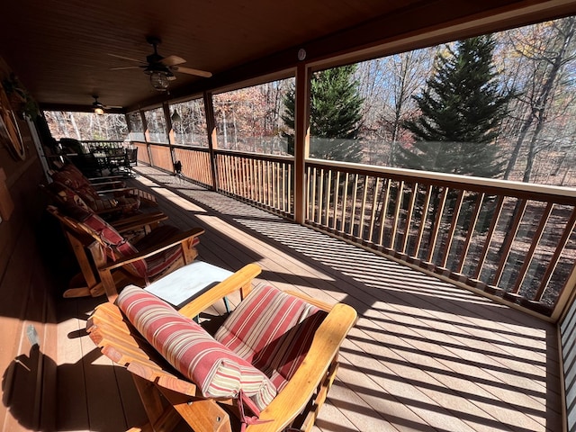 wooden deck with ceiling fan