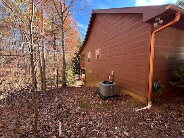 view of side of property featuring cooling unit