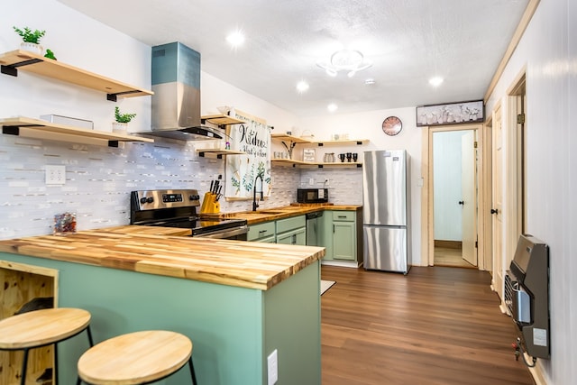 338 Canter Ct, Ellijay, GA 30540 - kitchen with butcher block counters, green cabinetry, appliances with stainless steel finishes, open shelves, and island range hood