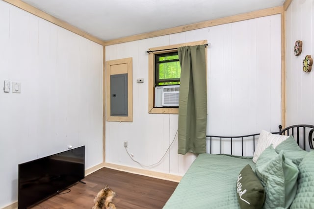 338 Canter Ct, Ellijay, GA 30540 - bedroom featuring electric panel, dark wood-style floors, cooling unit, baseboards, and wooden walls