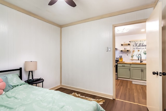 338 Canter Ct, Ellijay, GA 30540 - bedroom featuring wood finished floors, baseboards, ceiling fan, and a sink