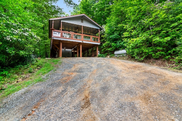 338 Canter Ct, Ellijay, GA 30540 - chalet / cabin with ceiling fan, dirt driveway, and a wooden deck