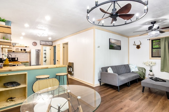 338 Canter Ct, Ellijay, GA 30540 - dining area with wood finished floors, ceiling fan, baseboards, and recessed lighting