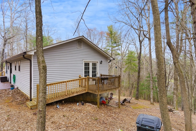 rear view of house with a deck