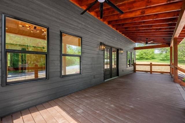 deck with ceiling fan, a porch, and french doors