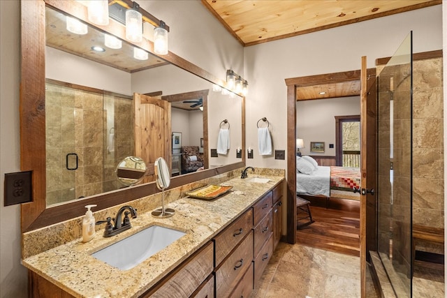 full bathroom with wooden ceiling, ensuite bathroom, and a sink