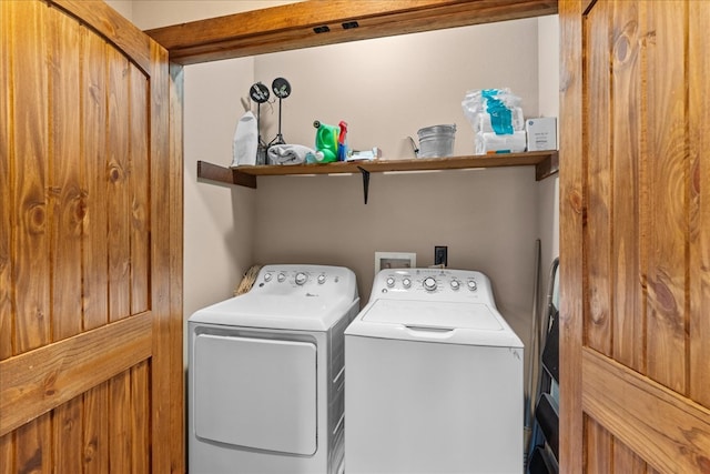 washroom with laundry area and separate washer and dryer