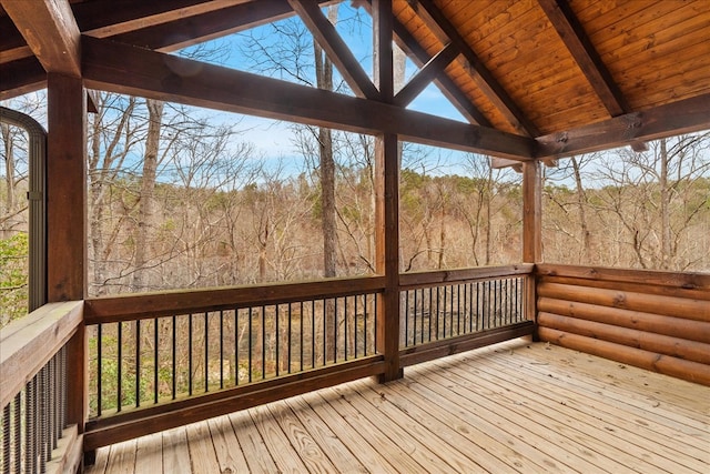 deck featuring a wooded view