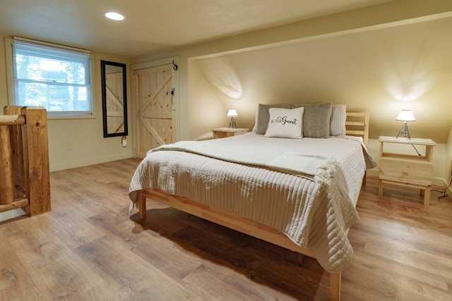 bedroom featuring light wood-type flooring