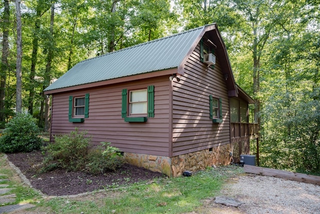 view of home's exterior with cooling unit