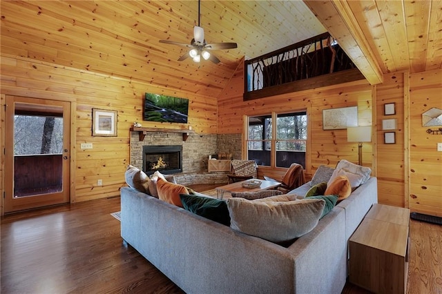 living room with wooden walls, a fireplace, dark hardwood / wood-style floors, and wooden ceiling