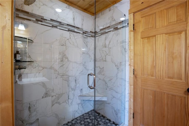 bathroom featuring an enclosed shower