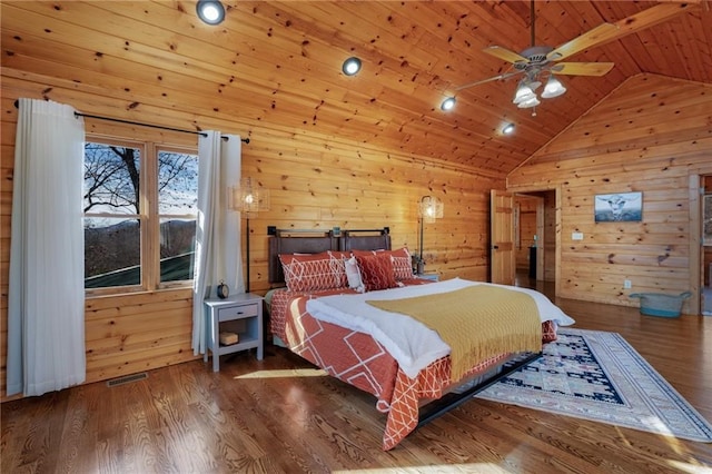 bedroom featuring wood ceiling, lofted ceiling, dark hardwood / wood-style floors, and wood walls