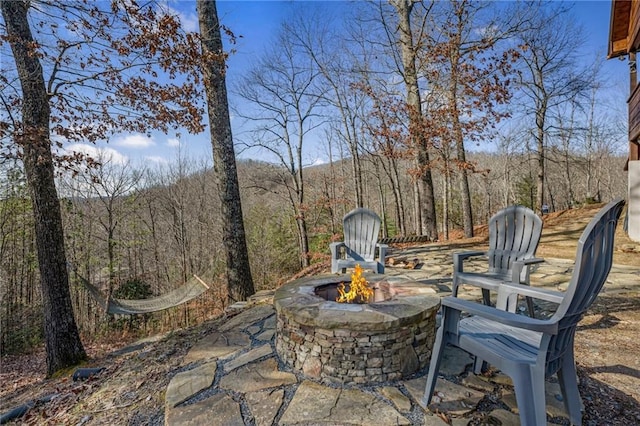 view of patio with an outdoor fire pit