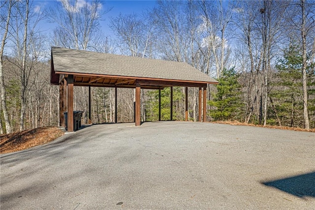 view of parking featuring a carport