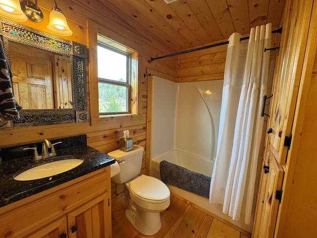 full bathroom with toilet, wood walls, wooden ceiling, vanity, and shower / bathtub combination with curtain