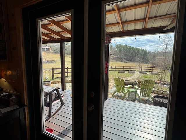 doorway to outside featuring a rural view