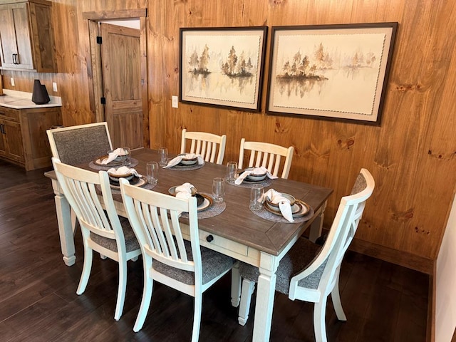 84 Grant Ln, Mineral Bluff, GA 30559 - dining area featuring wood walls and dark wood finished floors