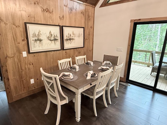 84 Grant Ln, Mineral Bluff, GA 30559 - dining area featuring dark wood-style flooring and wooden walls