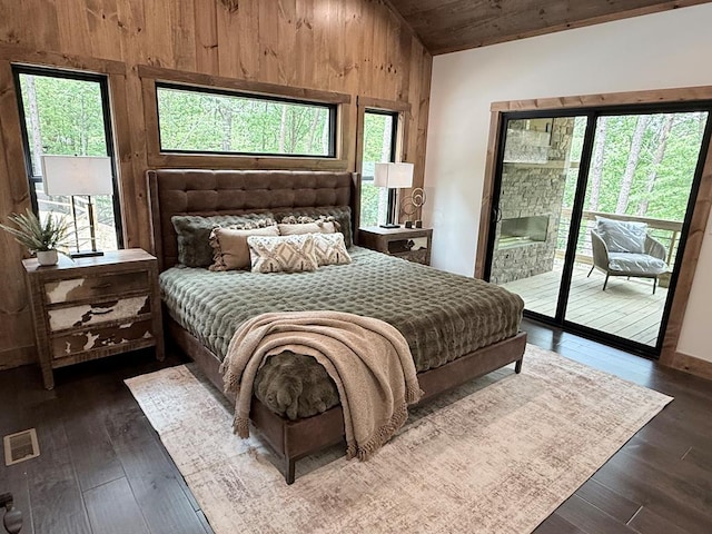 84 Grant Ln, Mineral Bluff, GA 30559 - bedroom featuring access to exterior, wood ceiling, wood walls, dark wood-style floors, and lofted ceiling