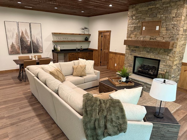 84 Grant Ln, Mineral Bluff, GA 30559 - living area featuring recessed lighting, wood ceiling, wainscoting, wood finished floors, and a fireplace