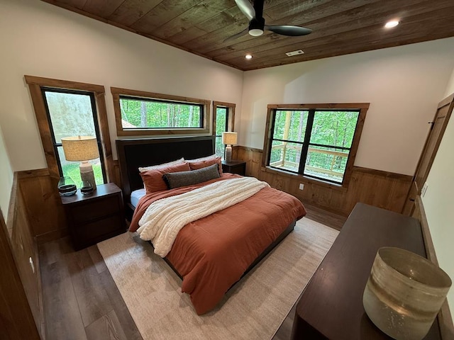 84 Grant Ln, Mineral Bluff, GA 30559 - bedroom featuring wainscoting, wooden ceiling, wood finished floors, wood walls, and multiple windows