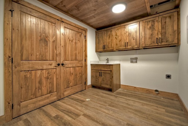 84 Grant Ln, Mineral Bluff, GA 30559 - laundry room with cabinet space, electric dryer hookup, wooden ceiling, light wood-type flooring, and baseboards