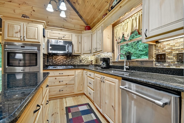 4527 Gates Chapel Rd, Ellijay, GA 30540 - kitchen with appliances with stainless steel finishes, wood ceiling, vaulted ceiling, light wood-style flooring, and decorative backsplash