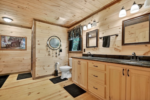 4527 Gates Chapel Rd, Ellijay, GA 30540 - bathroom with wooden ceiling, wooden walls, wood finished floors, and double vanity