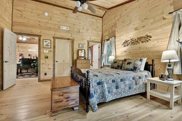4527 Gates Chapel Rd, Ellijay, GA 30540 - bedroom with wood walls, hardwood / wood-style floors, an office area, and beamed ceiling