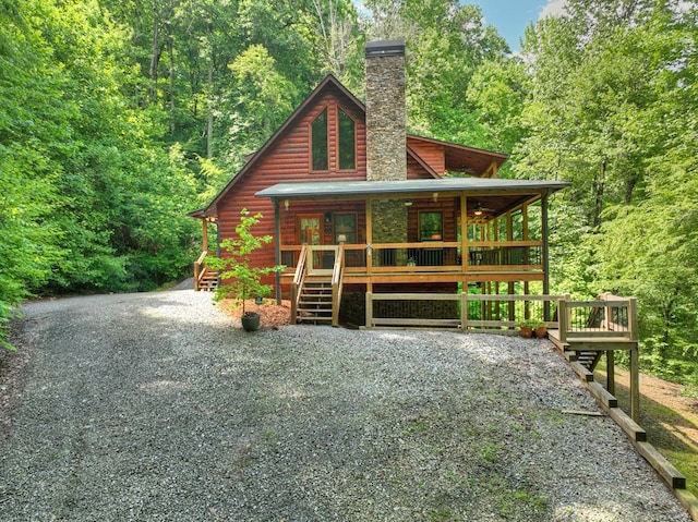 4527 Gates Chapel Rd, Ellijay, GA 30540 - view of front of property with a chimney, covered porch, and a wooded view