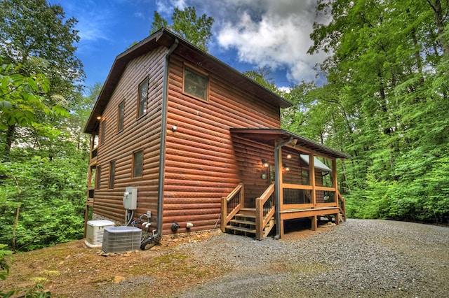 4527 Gates Chapel Rd, Ellijay, GA 30540 - view of home's exterior with faux log siding and a wooden deck