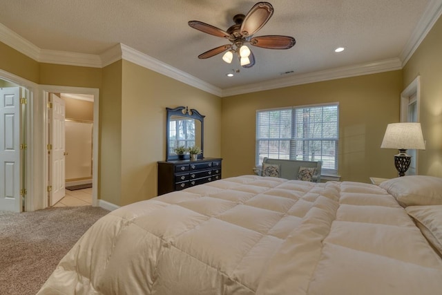 bedroom with a textured ceiling, light colored carpet, ceiling fan, and ornamental molding