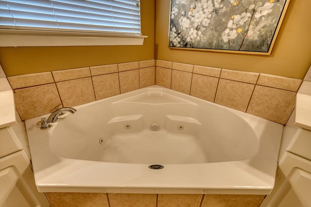 bathroom featuring tiled bath