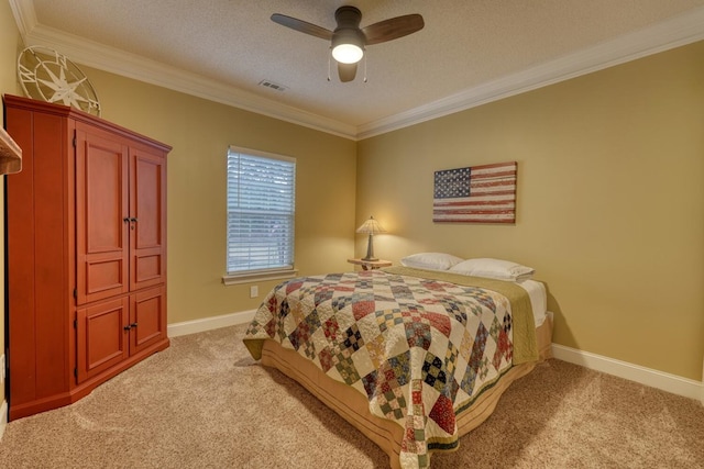 bedroom featuring ceiling fan, light colored carpet, ornamental molding, and a textured ceiling