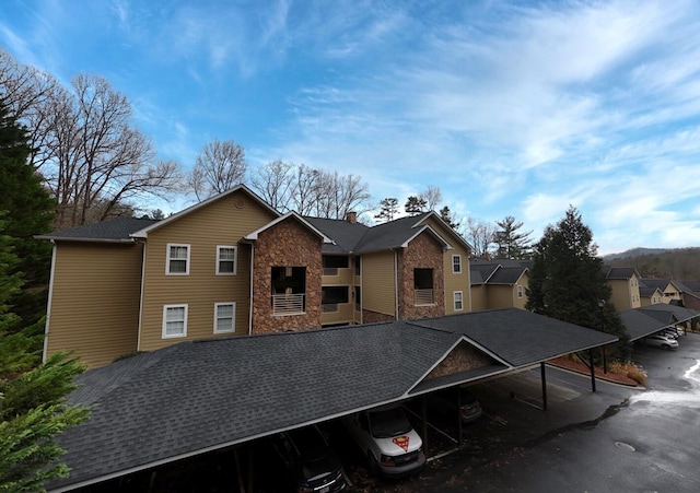 exterior space featuring a carport