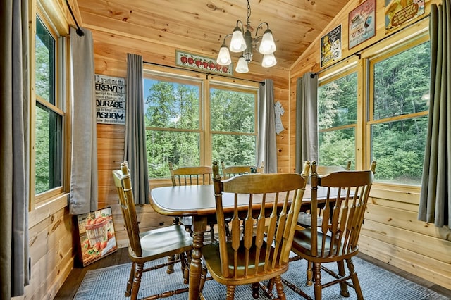 4525 Gates Chapel Rd, Ellijay, GA 30540 - dining area with hardwood / wood-style flooring, a chandelier, vaulted ceiling, wood ceiling, and wood walls