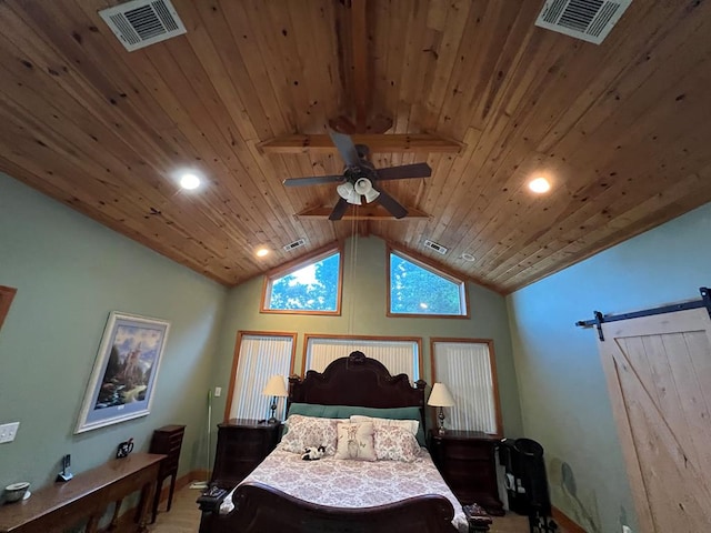 bedroom with a barn door, high vaulted ceiling, ceiling fan, and wood ceiling