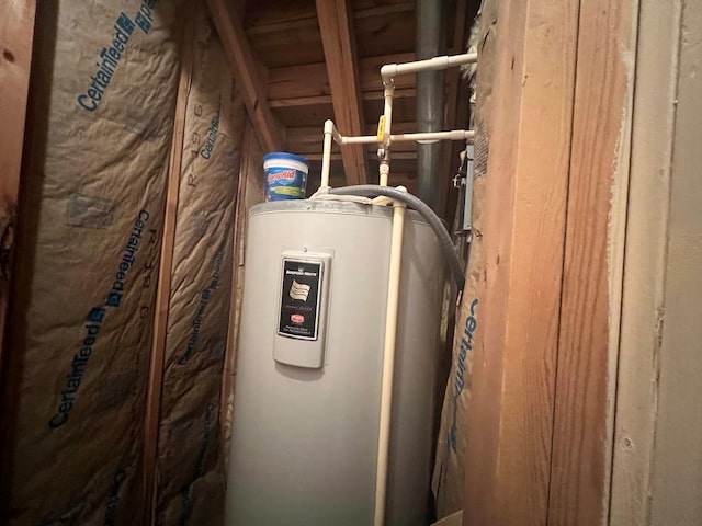 utility room with electric water heater