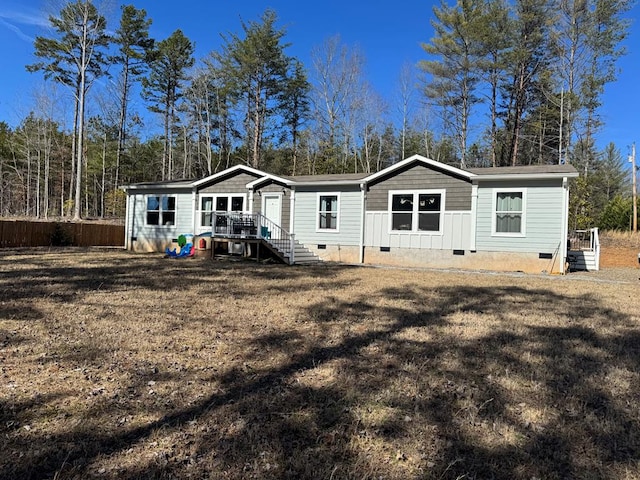 35 Bergan Moore Rd, Murphy, NC 28906 - rear view of house featuring crawl space and view of wooded area