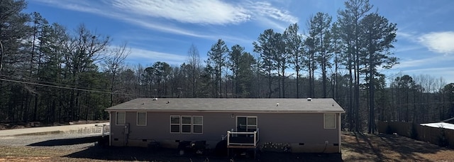 35 Bergan Moore Rd, Murphy, NC 28906 - rear view of house featuring crawl space and a view of trees