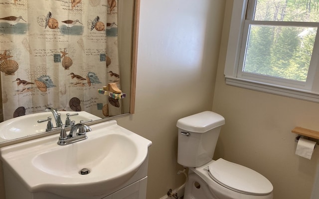 bathroom featuring sink and toilet