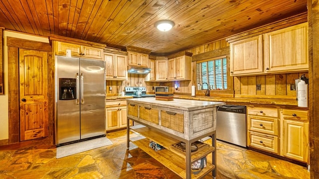 kitchen featuring under cabinet range hood, a sink, wood ceiling, and appliances with stainless steel finishes