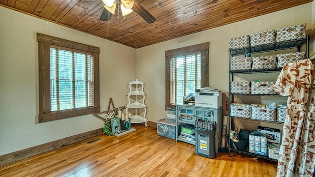 interior space with visible vents and a ceiling fan