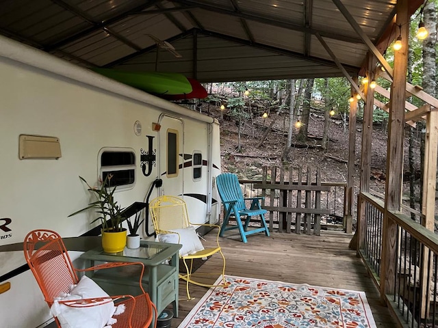 wooden terrace with a gazebo