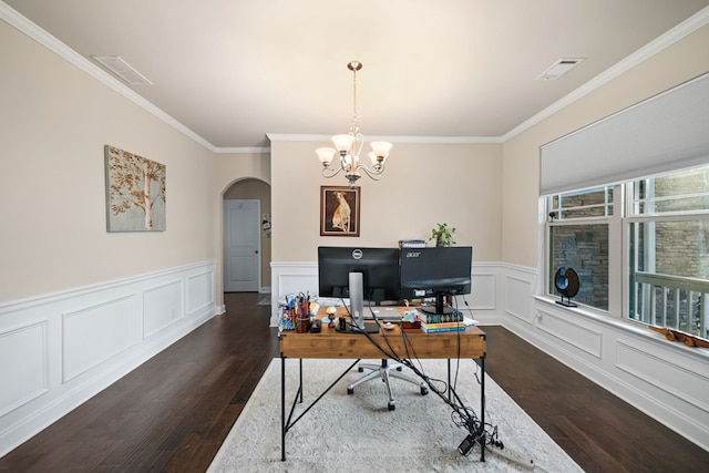 9475 Dunmoore Dr, Cumming, GA 30028 - home office featuring arched walkways, visible vents, dark wood finished floors, and an inviting chandelier