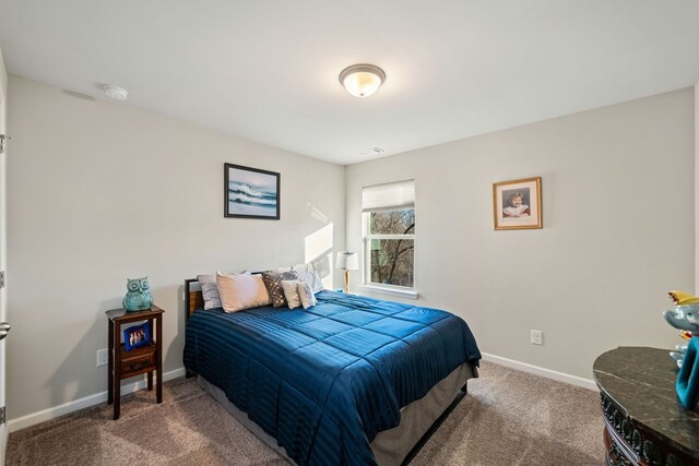 9475 Dunmoore Dr, Cumming, GA 30028 - bedroom with visible vents, baseboards, and carpet